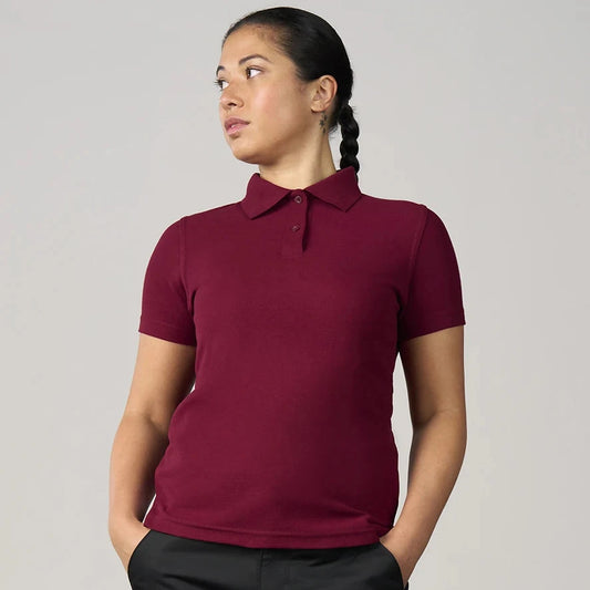 Person wearing a maroon polo shirt against a plain background